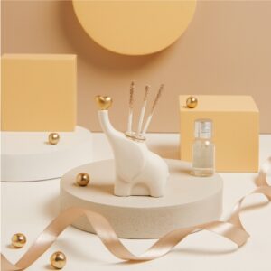 DIFFUSORE ELEFANTINO BIANCO CON CUORE ORO 7.5X4X10.5 CM